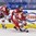 PLYMOUTH, MICHIGAN - APRIL 4: Czech Republic's Tereza Vanisova #21 skate with the puck while her teammate Aneta Ledlova #15 skates behind her with Switzerland's Sarah Foster #3 stick checks during relegation round action at the 2017 IIHF Ice Hockey Women's World Championship. (Photo by Minas Panagiotakis/HHOF-IIHF Images)
